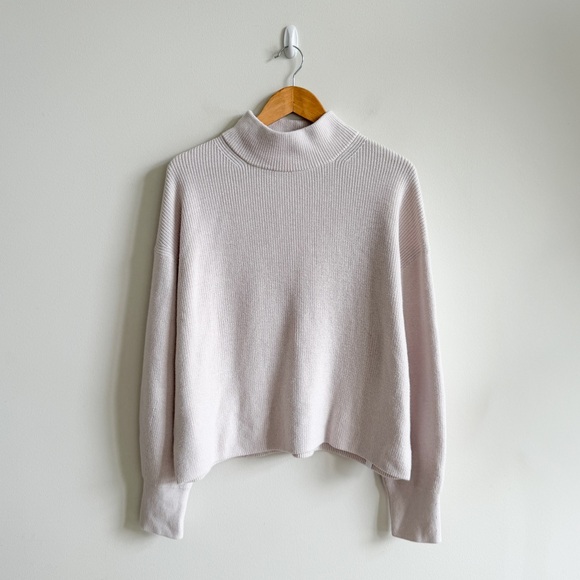 LULULEMON • Merino Wool-Blend Ribbed Turtleneck in Heathered Natural Ivory - Picture 3 of 10